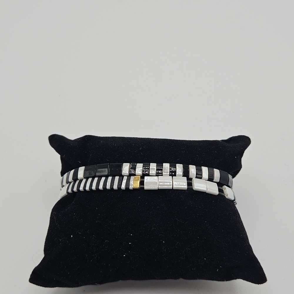 BPD pair of Pixie stretch bracelets black white gold